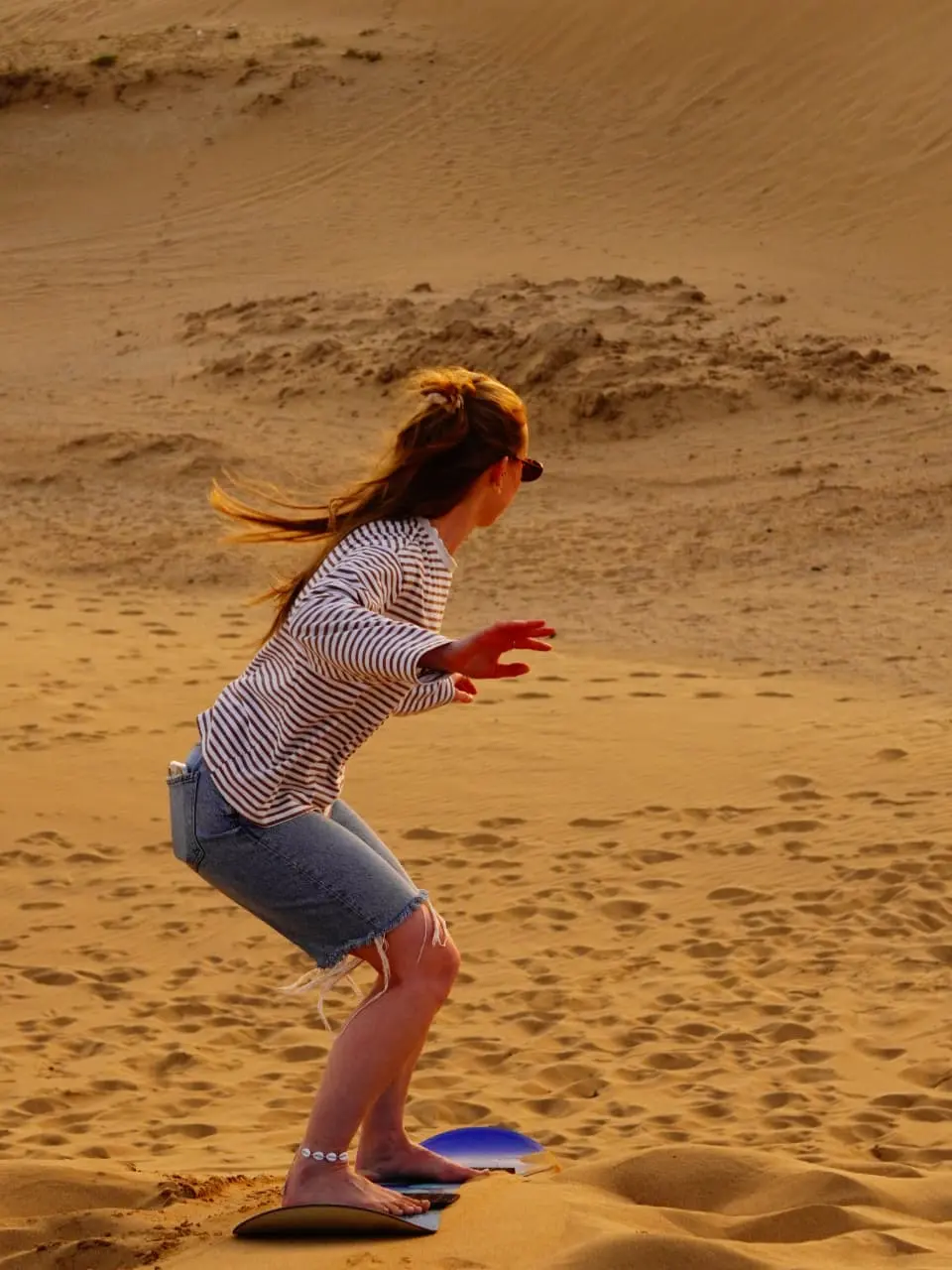 sandboarding on golden dunes at Timlalin near Imsouane Morocco – best things to do besides surfing