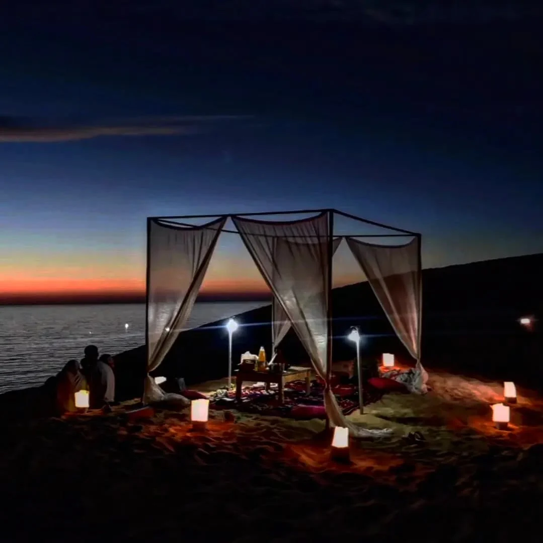 Moroccan dinner in Timlalin Dunes desert setting near Agadir under the stars